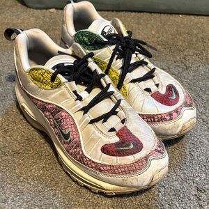 Nike White Sneakers with Pink and Yellow Accents